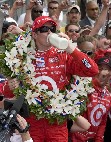 25 May, 2008, Indianapolis, Indiana, USA. Scott Dixon celebrates victory with milk. ©2008, Dan Streck, USA. LAT Photographic.