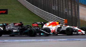 RedBull’s Sergio Perez fights off an advance from Lewis Hamilton in Sunday’s Turkish Grand Prix