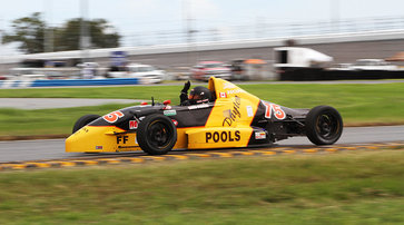 Rick Payne claimed the Formula F title with a last-lap pass in his Honda-powered Van Diemen.