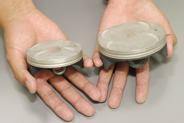 2004 Honda CRF250R piston (left), CRF450R piston (right).
