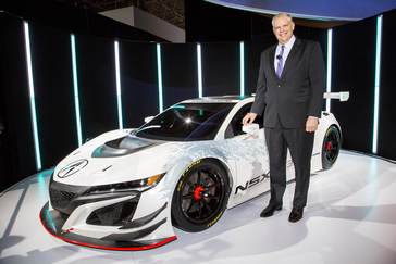 Art St. Cyr, president of Honda Performance Development, with the Acura NSX GT3 race car at the 2016 New York International Auto Show on March 23, 2016.
