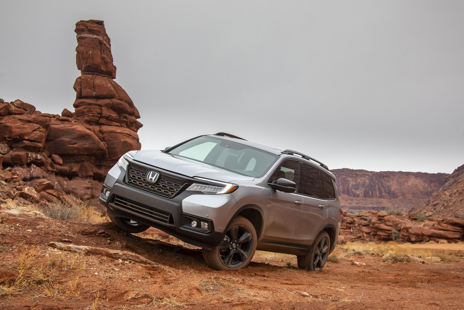 2019 Honda Passport shown as a rugged midsize two-row SUV with a rugged stance