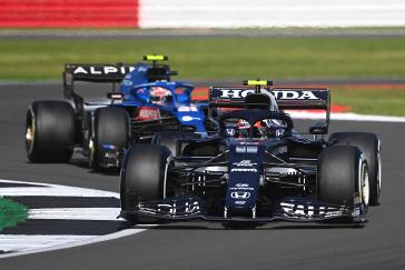 Pierre Gasly fights off Esteban Ocon in Sunday’s British Grand Prix.