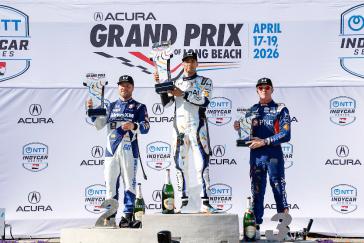 #10: Alex Palou, Chip Ganassi Racing Honda, #2: Josef Newgarden, Team Penske Chevrolet, #60: Felix Rosenqvist, Meyer Shank Racing w/Curb Agajanian Honda, #9: Scott Dixon, Chip Ganassi Racing Honda celebrate on the podium