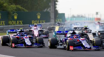 The Toro Rosso Hondas fight for space at the start of Sunday’s Hungarian Grand Prix