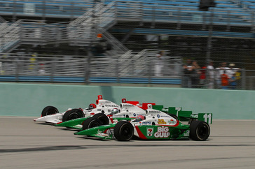2003 IRL IndyCar Homestead, 2/28 - 3/2/2003, Homestead Miami Speedway, USA, Castroneves, Andretti, and Kanaan race into turn 1. ©2003, Michael L. Levitt, USA LAT Photographic
