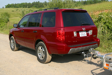 2003 Honda Pilot with Trailer Attached.

