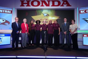 Honda executives congratulate North Carolina Central University (NCCU) for winning the 2026 Honda Campus All-Star Challenge national championship title. Pictured from left to right: Bob Nelson, executive vice president, American Honda; Tanya Alloway, vice president of Human Resources, American Honda; Chantel Chestnutt, NCCU junior; Ronni Butts, NCCU junior; Jadzia “Z” Kowalczyk, NCCU freshman; Clayton C. Mack, Jr., NCCU team coach; Alena Dockery, NCCU junior; Eric Walli, assistant vice president of Regional Planning, American Honda; and Elly Bradford, Chief Inclusion & Impact Officer, American Honda.