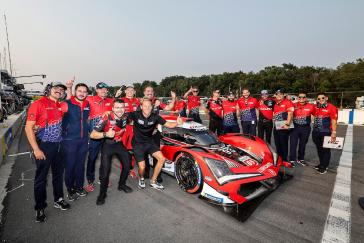 Motul Pole Award winner #93: Acura Meyer Shank Racing w/Curb Agajanian, Acura ARX-06, GTP: Nick Yelloly celebrates with teammate Renger Van der Zende and Acura HRC engineers