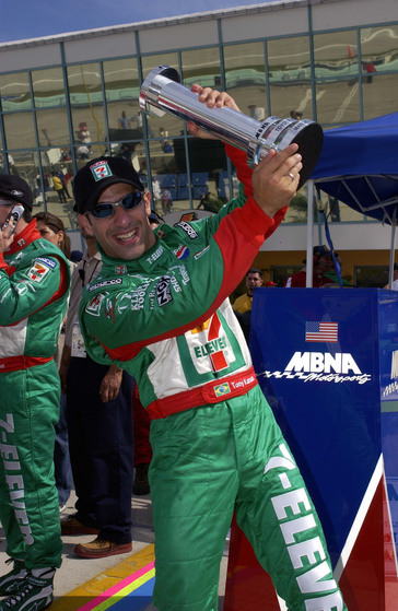 2003 IRL IndyCar Homestead, 2/28-3/2,2003, Homestead-Miami Speedway, USA, A Happy Tony Kanaan celebrates his first IRL pole. World Copyright©F.Peirce Williams 2003 LAT Photographic
