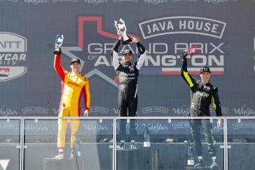 #27: Kyle Kirkwood, Andretti Global Honda, #10: Alex Palou, Chip Ganassi Racing Honda, #26: Will Power, Andretti Global Honda celebrate on the podium