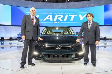 Jeff Conrad, senior vice president, Automobile Division of American Honda Motor Co. Inc., and Steven Center, vice president of the Connected and Environmental Business Development Office at American Honda with the new Clarity Plug-In Hybrid at the 2017 New York International Auto Show on Wednesday, April 12 2017.