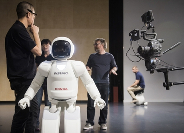 ASIMO prepares to be filmed by a European crew.