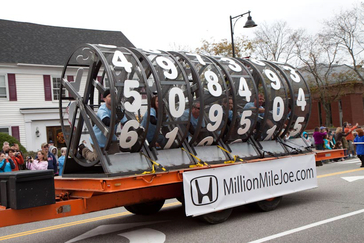 On Oct. 23, 2011, Honda hosted a surprise parade in Saco, Maine, to celebrate Joe LoCicero's amazing accomplishment of hitting one million miles on his 1990 Honda Accord. The parade interrupted a brief press conference where Joe was scheduled to receive an oversized key to a new 2012 Honda Accord from Ms. Maine, Ashley Marble
.

The city of Saco was the venue for a one-block-long celebratory "Million Mile Joe" parade that featured:

-giant odometer float powered by six people spinning life-sized hamster wheels;
-airplane banner congratulating Joe;
-Biddeford High School student-made floats;
-Westbrook High School marching band and color guard;
-Saco Middle School Marching Band;
-Shoestring Theater stilt walkers; and
-over-the-top costumed characters.

While the typical driver clocks about 14,000 miles per year, Joe does that in about three months. Joe's 1990 Honda Accord has taken him one million miles over the past 15 years, a feat that speaks to the reliability of his Honda as well as the dedication of its driver to reach this unique milestone. As Joe approached the one-million-mile mark, Honda fans have been following his journey on www.millionmilejoe.com.