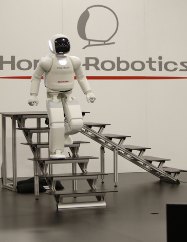 ASIMO climbs down the stairs at a recent demonstration in Marysville