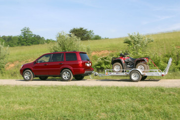 2003 Honda Pilot with Trailer Attached.
