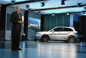 Detroit - January 9, 2006 - John Mendel, senior vice president of American Honda Motor Co., Inc., unveils the Acura RDX Prototype SUV today at the 2006 North American International Auto Show in Detroit. The RDX features Super Handling All-Wheel Drive (SH-AWD) and an innovative 2.3-liter four-cylinder turbocharged engine. The all-new RDX is designed to redefine the entry premium SUV segment. This near-production prototype provides an advance preview of the all-new RDX that will go on sale this summer.  For more information go to www.acuranews.com.