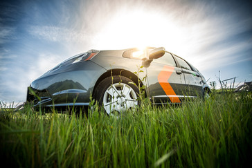Zipcar ONE>WAY service featuring the Honda Fit.