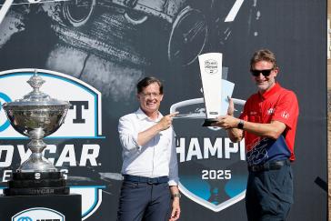 IndyCar president Doug Boles presents the Manufacturers Trophy to Honda HRC President David Salters