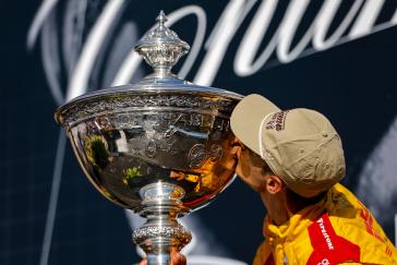 #10: Alex Palou, Chip Ganassi Racing Honda, Kisses the Astor Challenge Cup