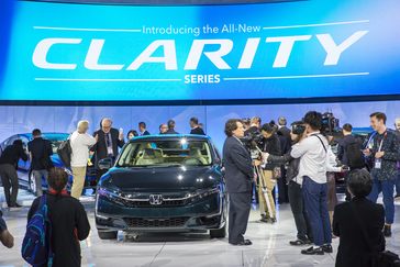 Members of the media check out the new Clarity Plug-In Hybrid and Clarity Electric at the 2017 New York International Auto Show on Wednesday, April 12 2017.