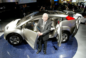Tom Elliott, executive vice president of American Honda, with the Acura RD-X SUV concept at the 2002 North American International Auto Show. Targeted at youthful, urban professionals, the Acura RD-X combines the performance and sporty character of a coupe with the four-wheel drive and functionality of a sport-utility vehicle.