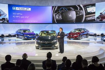 Steven Center, vice president of the Connected and Environmental Business Development Office at American Honda Motor Co. introduces the new Clarity Plug-In Hybrid and Clarity Electric at the 2017 New York International Auto Show on Wednesday, April 12 2017.