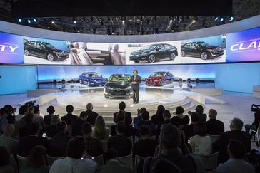 Steven Center, vice president of the Connected and Environmental Business Development Office at American Honda Motor Co. introduces the new Clarity Plug-In Hybrid and Clarity Electric at the 2017 New York International Auto Show on Wednesday, April 12 2017.


