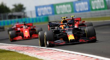 Aston Martin Red Bull’s Alex Albon uses his Honda power to hold off a pair of Ferraris in Sunday’s Hungarian Grand Prix