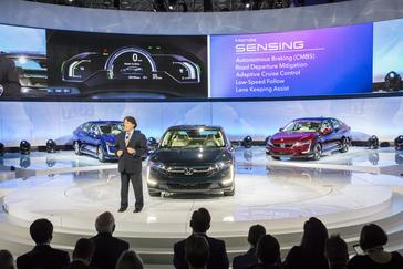 Steven Center, vice president of the Connected and Environmental Business Development Office at American Honda Motor Co. introduces the new Clarity Plug-In Hybrid and Clarity Electric at the 2017 New York International Auto Show on Wednesday, April 12 2017.