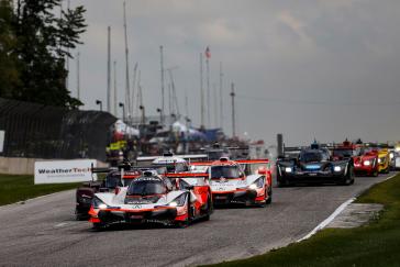 Helio Castroneves found traction with his Acura ARX-05 where others could not, as he and his Acura Team Penske co-driver Ricky Taylor prevailed in monsoon-like conditions in the final hour to win Sunday’s IMSA WeatherTech SportsCar Championship race at Road America.